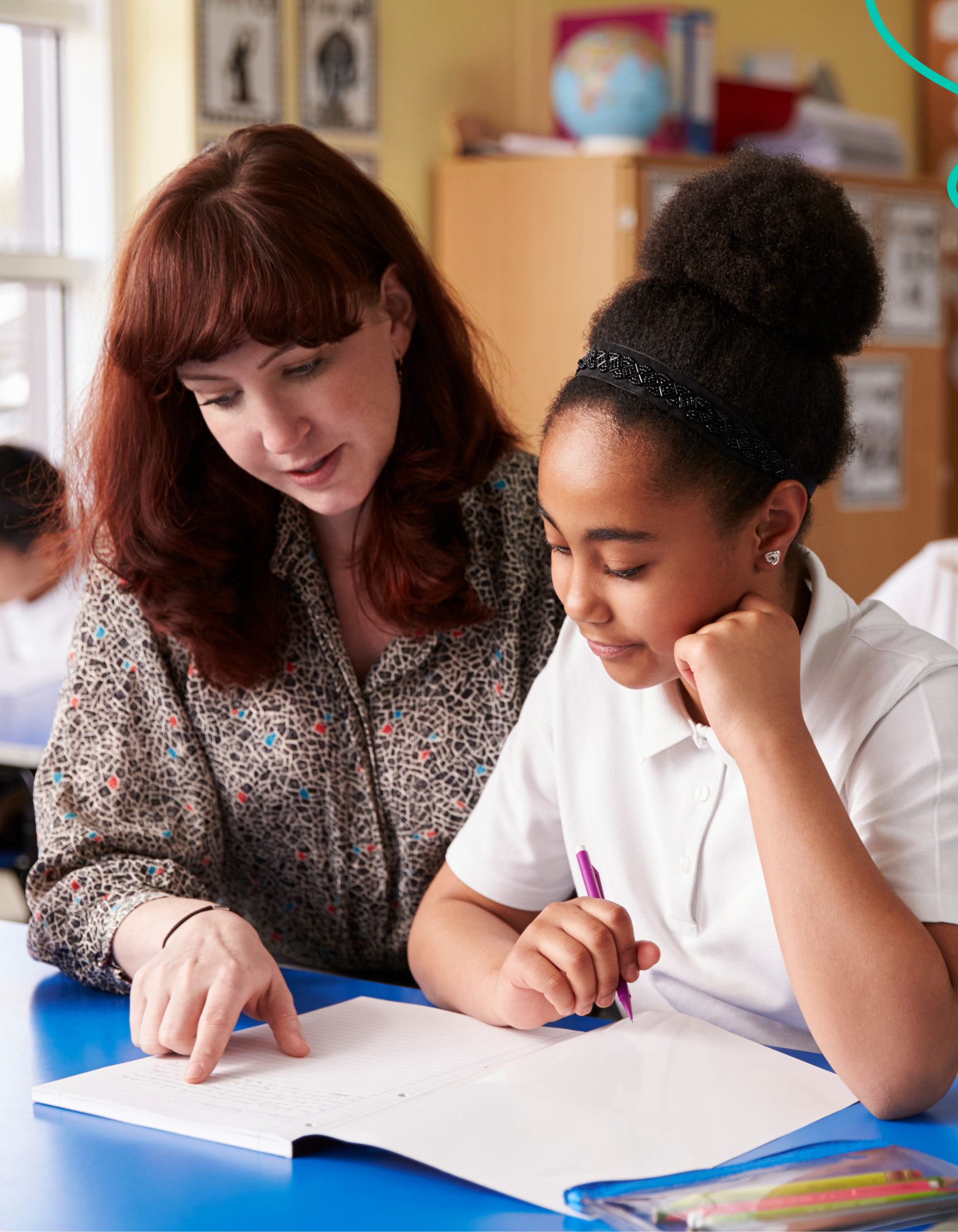 A teacher reading with a child